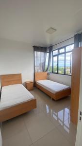 Ένα ή περισσότερα κρεβάτια σε δωμάτιο στο Seaview Apartments