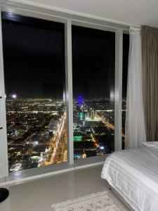 En eller flere senge i et værelse på شقة برج رافال Rafal Tower