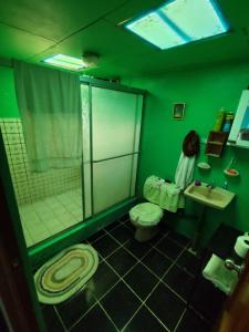 Et badeværelse på Hospedaje refugio en el Bosque