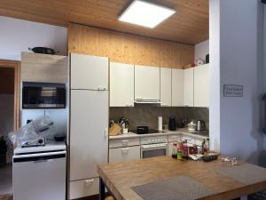 Kuchyň nebo kuchyňský kout v ubytování Gasthaus Schöntal