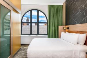 Ένα ή περισσότερα κρεβάτια σε δωμάτιο στο SpringHill Suites by Marriott Baltimore Downtown Convention Center Area +62 φωτογραφίες
