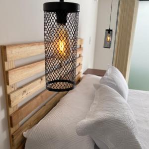 Postel nebo postele na pokoji v ubytování Apartaestudio Loft 102 - UE Home