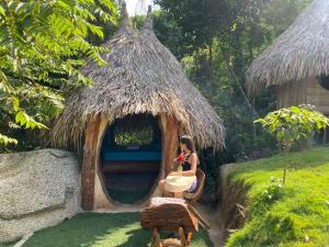 Aed väljaspool majutusasutust Hostal Paraíso Tayrona Kogui