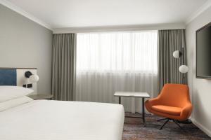 Postel nebo postele na pokoji v ubytování Glasgow Marriott Hotel
