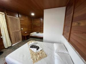 Postel nebo postele na pokoji v ubytování HOTEL RM