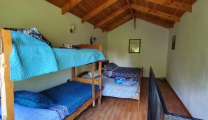 Postel nebo postele na pokoji v ubytování Casa de Verano Pucura