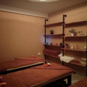 Postel nebo postele na pokoji v ubytování Essenza Hotel Đà Nẵng