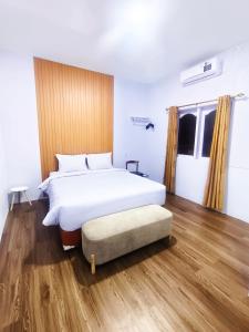 Postel nebo postele na pokoji v ubytování D'Rey Hotel