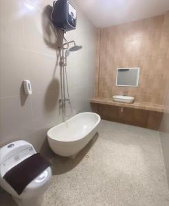 Koupelna v ubytování D'Rey Hotel + 4 fotografie