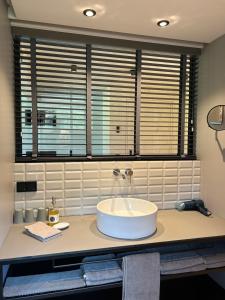 Bagno di Bio Design Appartements DAS GRAUE SCHAF - Kärnten Card im Sommer inklusive
