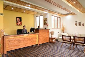 The Dunes Boutique Hotel的电视和/或娱乐中心