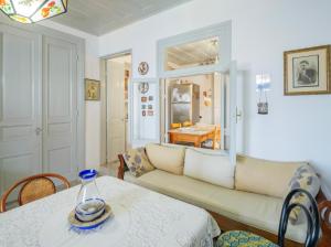 a living room with a couch and a table at V. Molova, Molyvos, Lesvos in Mythimna