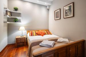 Postel nebo postele na pokoji v ubytování Apartamenty za Strugiem Zakopane