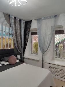 Posteľ alebo postele v izbe v ubytovaní London Apartment, Odessa