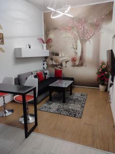 Televízia a/alebo spoločenská miestnosť v ubytovaní London Apartment, Odessa + 10 fotografií