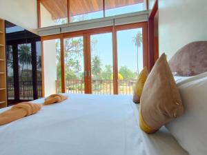 Ảnh trong thư viện ảnh của Pranaluxe 4 Bedroom Pool Villa C7 ở Ban Pak Nam Pran