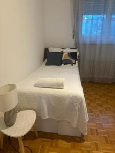 Postel nebo postele na pokoji v ubytování Kami
