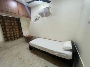 Postel nebo postele na pokoji v ubytování KBROS Homestay