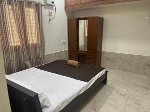 Postel nebo postele na pokoji v ubytování KBROS Homestay