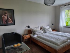 Ein Bett oder Betten in einem Zimmer der Unterkunft Auf "Kleine Wiesen"