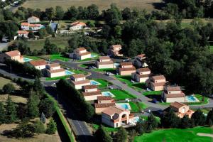 an aerial view of a village with houses at Lagrange Vacances - Royal Green in Pont-de-Larn