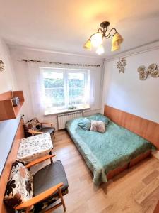 Posteľ alebo postele v izbe v ubytovaní Kacperek w centrum Willowa 4A