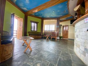 Ruang duduk di Dulcify cottage sarangkot