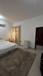 Letto o letti in una camera di Qantab Village Stay