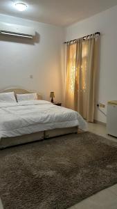 Letto o letti in una camera di Qantab Village Stay