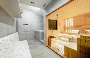 Postel nebo postele na pokoji v ubytování Aparthotel RAJSKA Jahorina