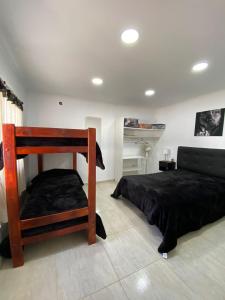 Ένα ή περισσότερα κρεβάτια σε δωμάτιο στο Timperio