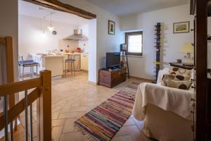 Kuchyň nebo kuchyňský kout v ubytování Santa Fiora Ospitalità Diffusa - La Vecchia Officina