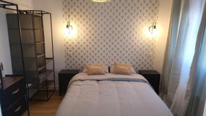 Postel nebo postele na pokoji v ubytování Appartement T2 Frangy