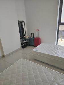 Giường trong phòng chung tại Texico Muscat Down TownHostel