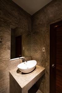 Koupelna v ubytování A Hotel Cozy + 37 fotografií
