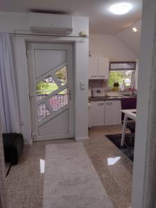 Kuchyň nebo kuchyňský kout v ubytování Apartman Breza