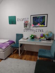 Postel nebo postele na pokoji v ubytování Apartman Breza