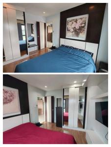 a bedroom with a blue bed and a mirror at Blue and green Farang homes in Chiang Mai