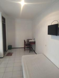 Μια τηλεόραση ή/και κέντρο ψυχαγωγίας στο Hotel Candrakirana