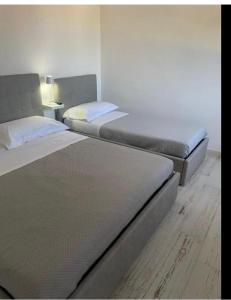 Postel nebo postele na pokoji v ubytování Maison appartaments