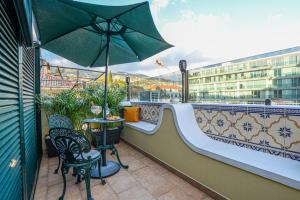 En balkon eller terrasse på Casa Laurinda Funchal