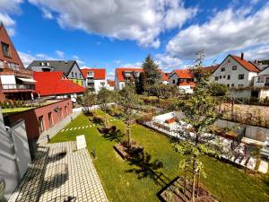 Zahrada ubytování Özels Designer Loft Metzingen - Smart TV, Netflix, private kostenlose Tiefgarage, Self-Express Check-in,Check-out, Outlet 100m