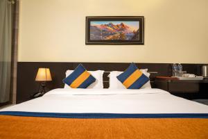 Letto o letti in una camera di Devo Boutique Hotel