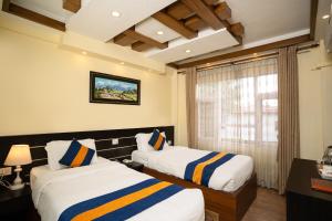 Letto o letti in una camera di Devo Boutique Hotel