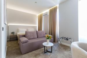 Posezení v ubytování Move In Apartments