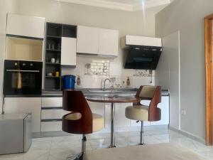 Dapur atau dapur kecil di Luxury Rentals