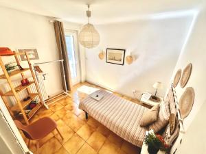 Letto o letti in una camera di Chambres d'hôtes Avignon