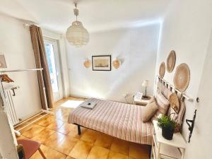 Letto o letti in una camera di Chambres d'hôtes Avignon