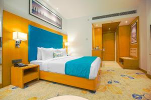 Best Western Plus Chandigarh Mohali客房内的一张或多张床位