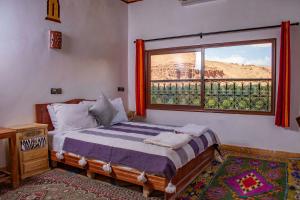 Postel nebo postele na pokoji v ubytování Hotel Awayou